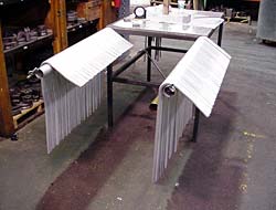 One X Three mild steel rectangle bent in H-Plane for medical carts.